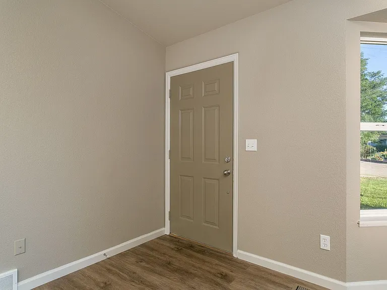 Front Door - home has fresh paint and new flooring