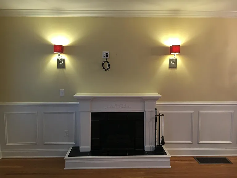 Living room faux fireplace with mantel and marble hearth, hook up for above mantel tv.