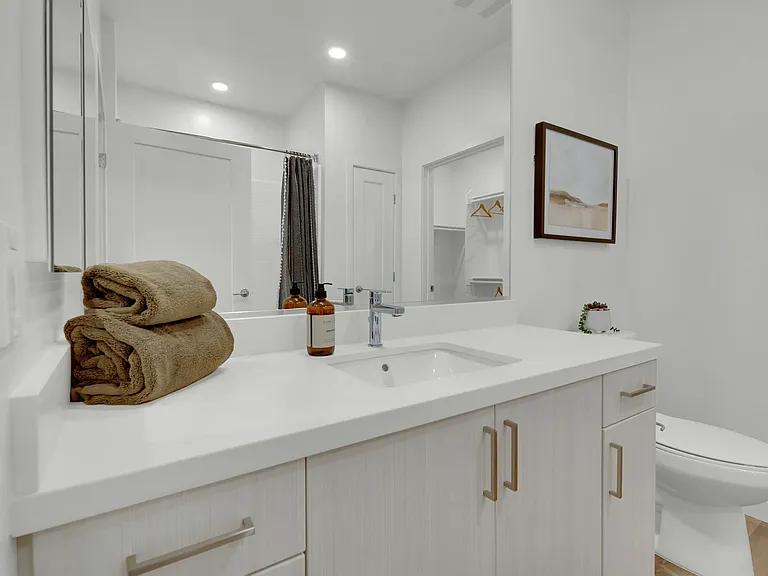 Ensuites with extra storage at Enclave Heritage Flats in Otay Ranch