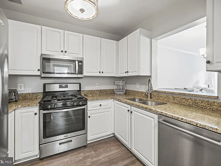 7011 Falls Reach Dr #103 — Photo 4