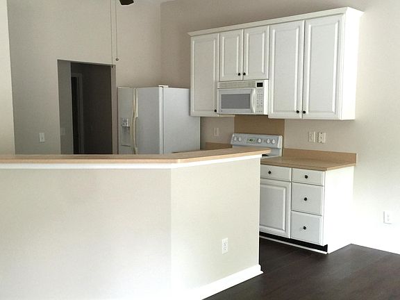 Open kitchen with room for barstools