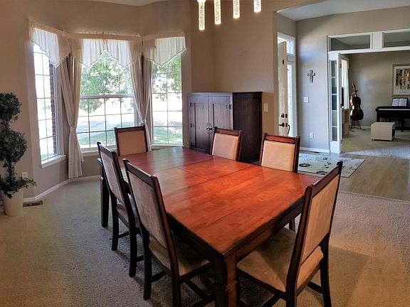 Dining room and sitting room off the main entry.