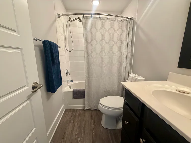 Guest bathroom with bath and shower