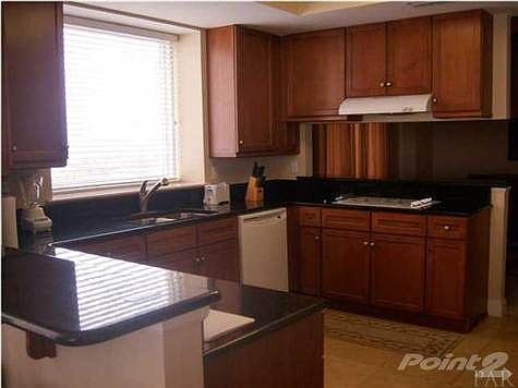 The dining table has plenty of room for family and friends.