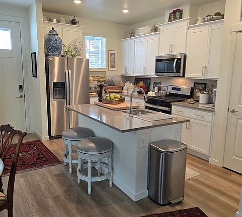 Kitchen with center island sink