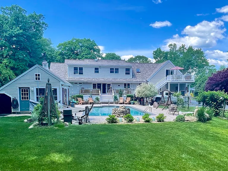summer photo of the backyard and pool