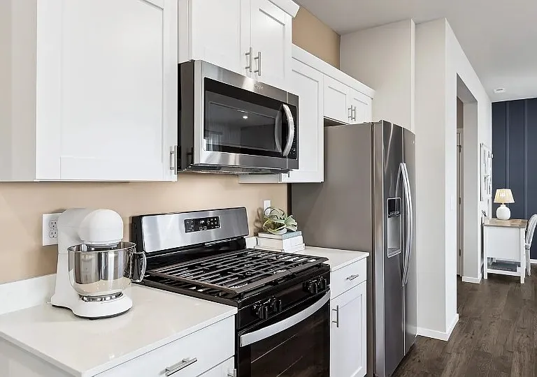 Builders inspiration images, kitchen. The actual home has similar appliances and cupboards.