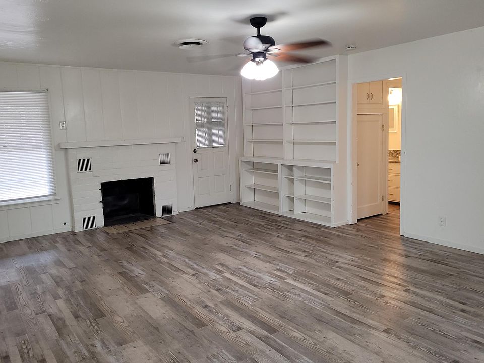 Living room with view to hallway.