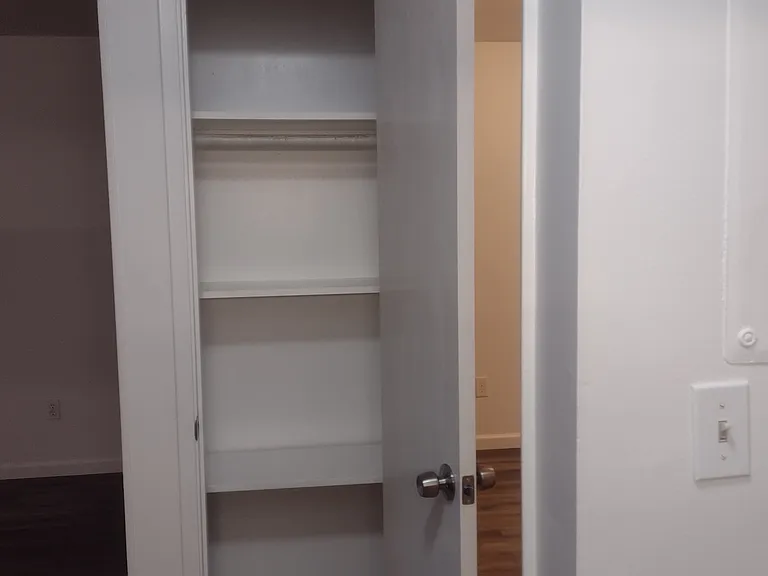 Closet that can be used as a coat closet or additional kitchen pantry.