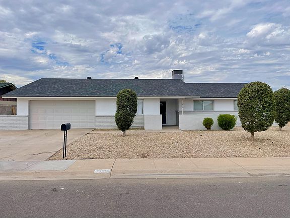 2 car garage and ample driveway parking