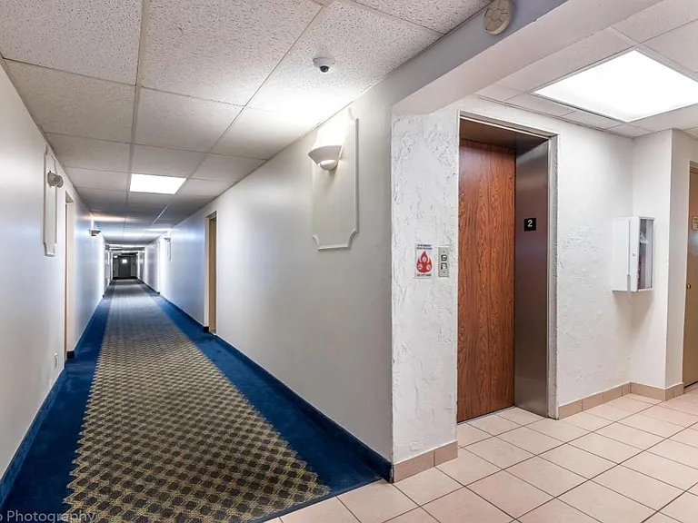 view of hallways and elevator