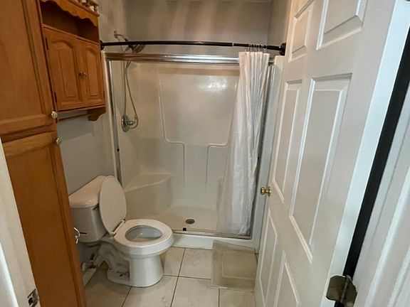 Master Bath has walk-in shower. 2nd bath has tub/shower.