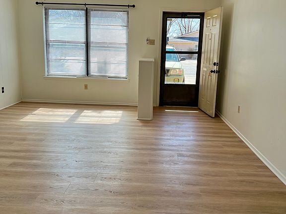 Door Front, Built-in bookshelf -- creates a separate entry way