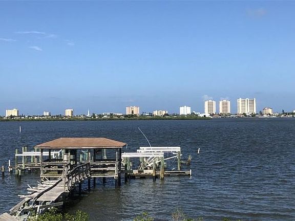 Watch the boats cruise by from your private deck