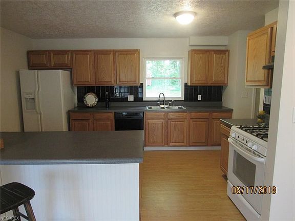 Breakfast bar. Lots of cabinets and ample counter space.