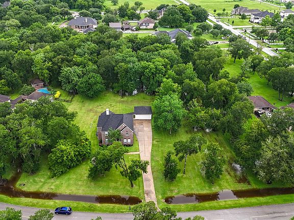 5th image of 7110 Rustling Oaks Dr
