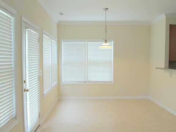 Breakfast room. Kitchen to the right. Family room behind.
