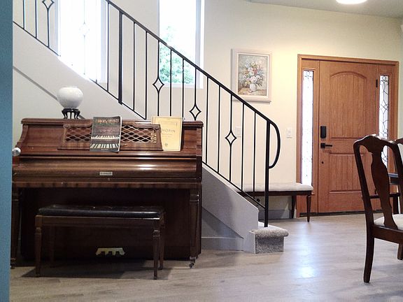 Stairwell to 2nd Story and Piano