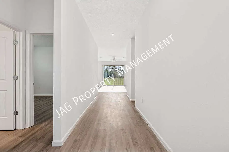 "Charming 4-Bedroom Oasis with 2 Full Baths in Palm Bay - Spacious 1,801 Sq. Ft. Home Awaiting Yo... — Photo 3