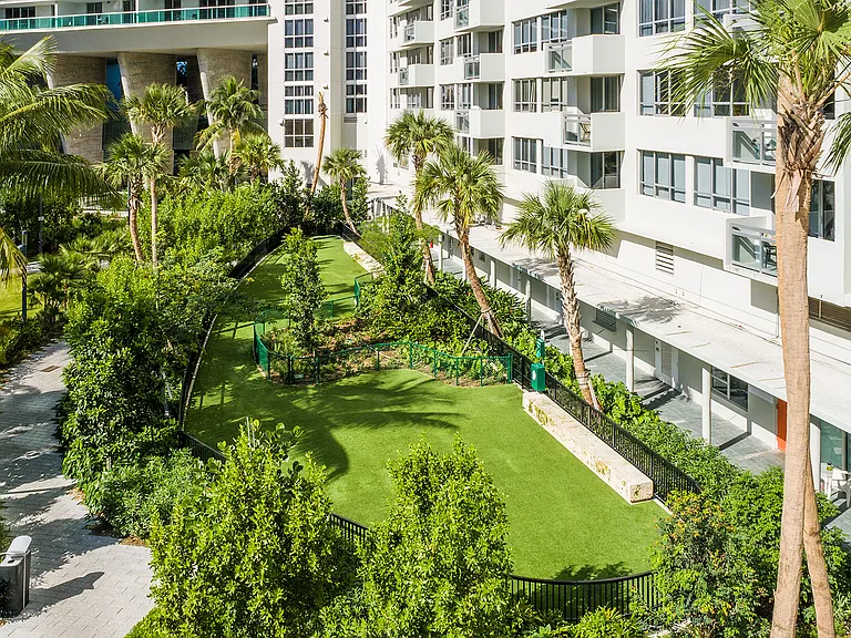 Your furry friend gets their very own dog park, with plenty of space to run free and enjoy the lush green grass