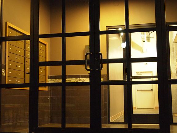 Entry to building with 28 condos