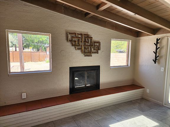 Dining, sitting area w/fireplace