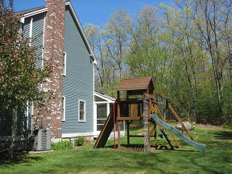 Swing set on the side lawn
