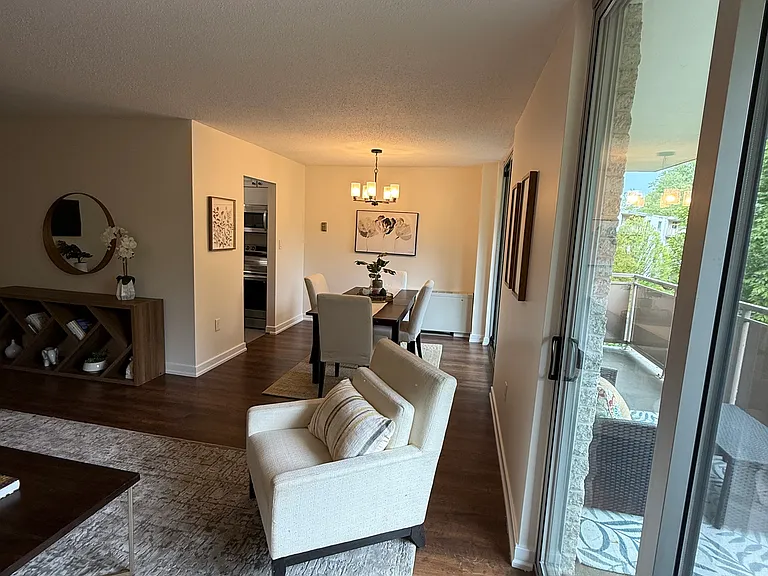 Living area with view of dining area