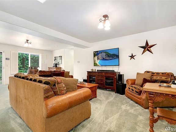 Open living room with plenty of natural daylight.
