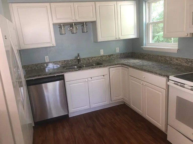 Granite countertops and breakfast bar