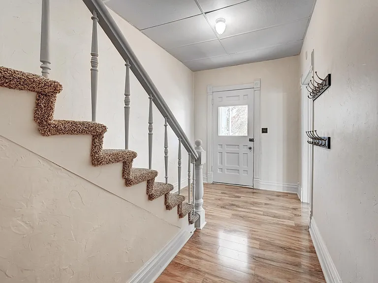 Gracious entry has room for all your coats and other necessities!