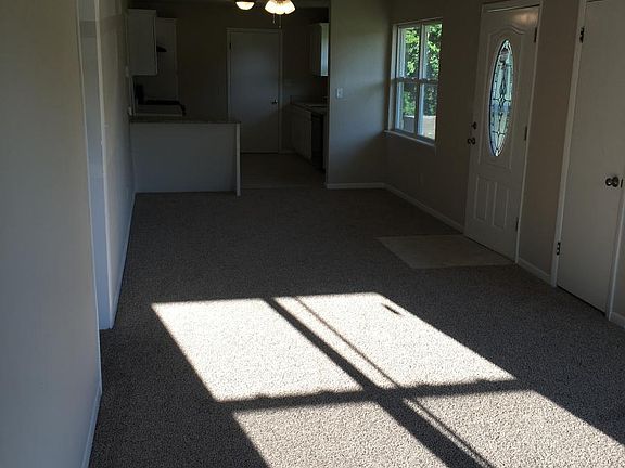 Livingroom view through dining and kitchen
