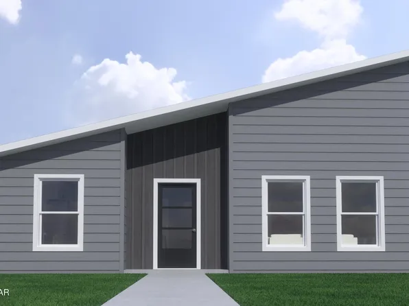 702 N Fountain St, Carterville, MO 64835