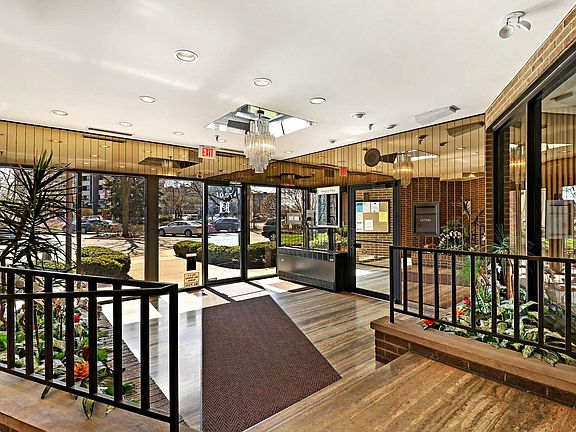 The inner lobby has 2 elevators that go up to unit