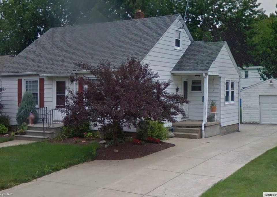Front View of house and garage.