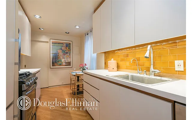 Sold by Douglas Elliman | media 17