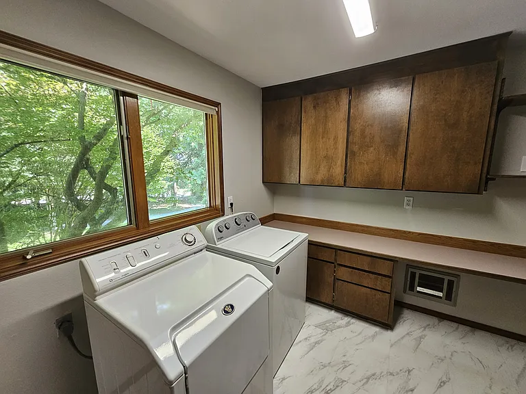 Tons of cabinet space and room to fold laundry.