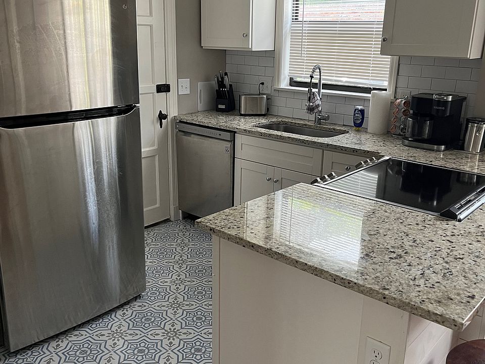Well appointed kitchen, open to dining, modern appliances