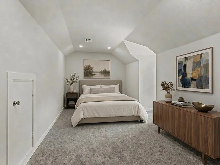 Virtual staged photo of upstairs game room/bonus room which could serve as a 4th bedroom!