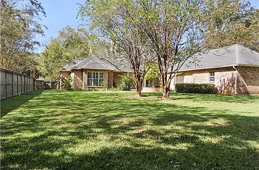 Spacious shaded backyard