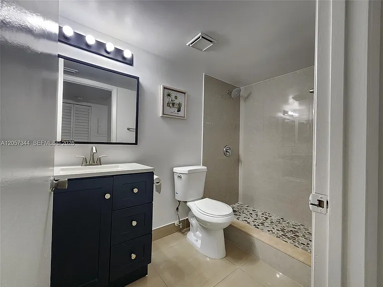 9491 Palm Cir S #205 — Photo 10