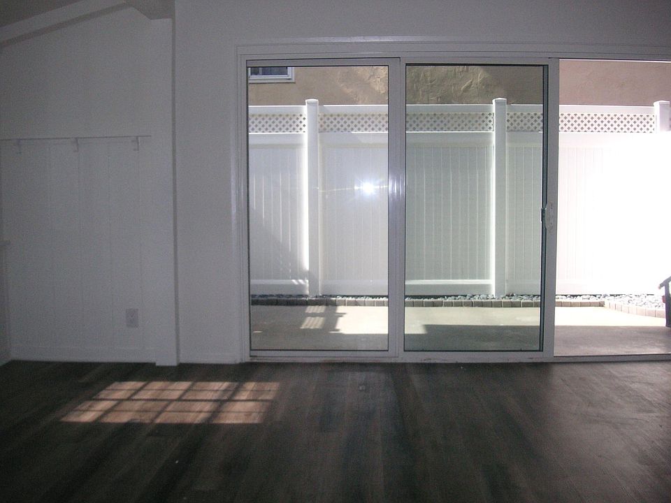 NEW RECESSED LIGHTING. NEW PAINT. NEW PATIO FENCE.