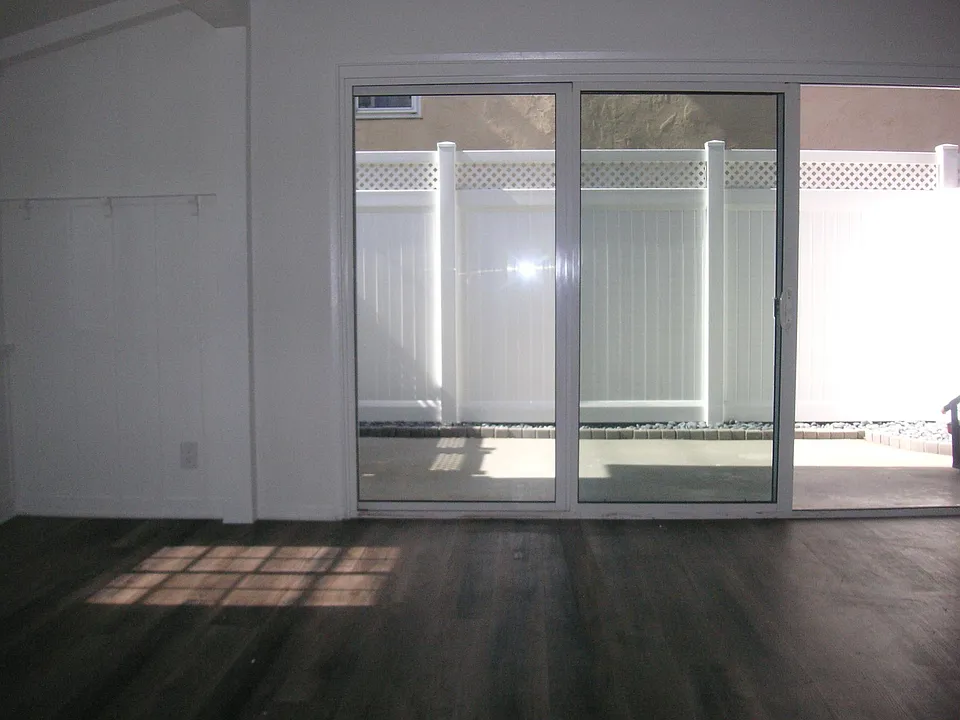 NEW RECESSED LIGHTING. NEW PAINT. NEW PATIO FENCE.