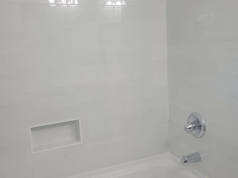 New bathtub and tile