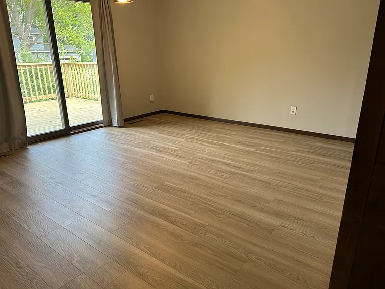 Dining Room looking out at the new deck and creek view.