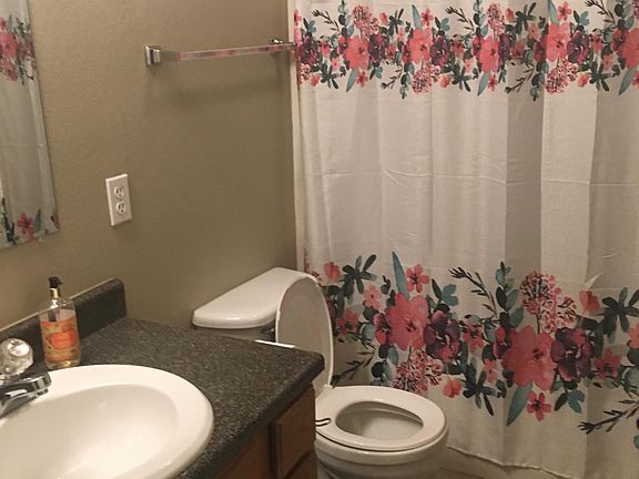 Main hallway full bath, also has a nook laundry area