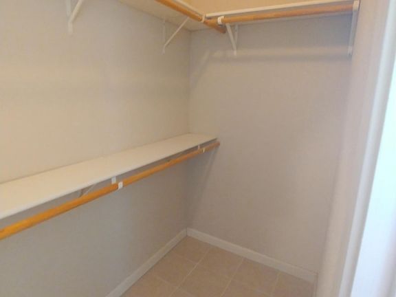 Walk in closet in master bedroom