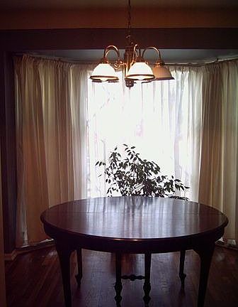 floor-to-ceiling windows in dining room