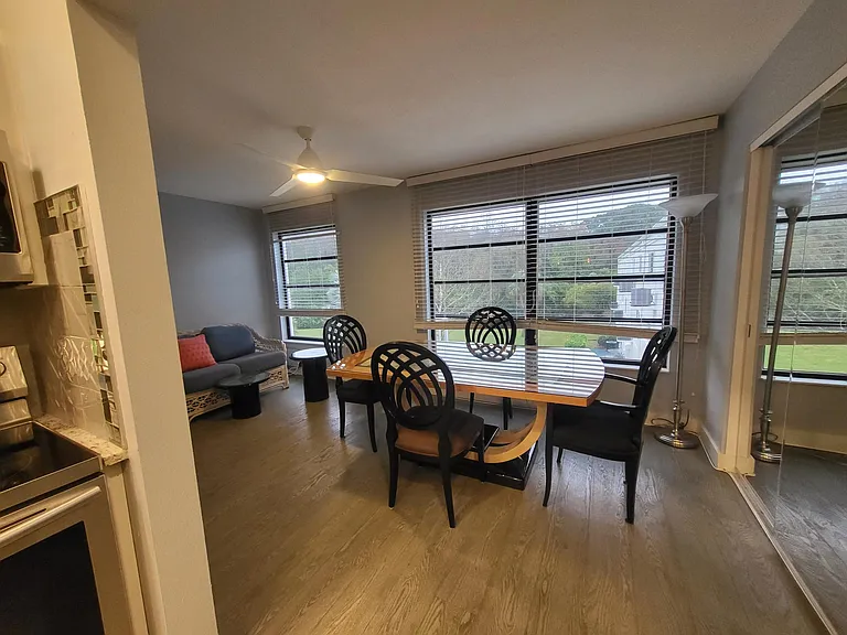 Large dining and sitting area with unobstructed, gorgeous garden views