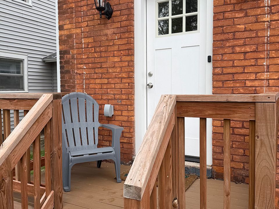 Entrance is on the back of the building with a small private deck.
